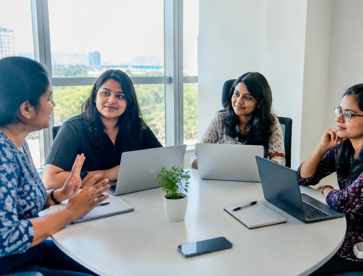 Women founders in a collaborative discussion